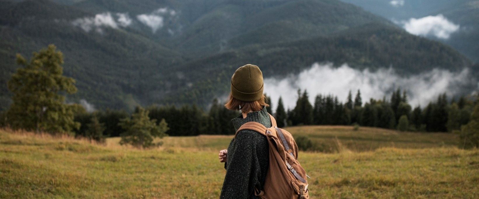 Girl hiker looking out panoramic.jpg